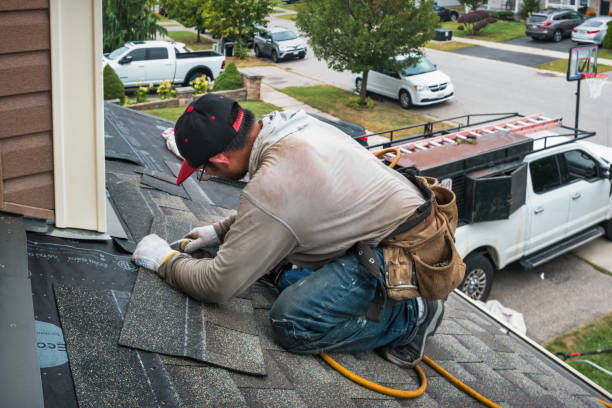 Professional Gutter Repair And Installation technician working in Hancock, MI